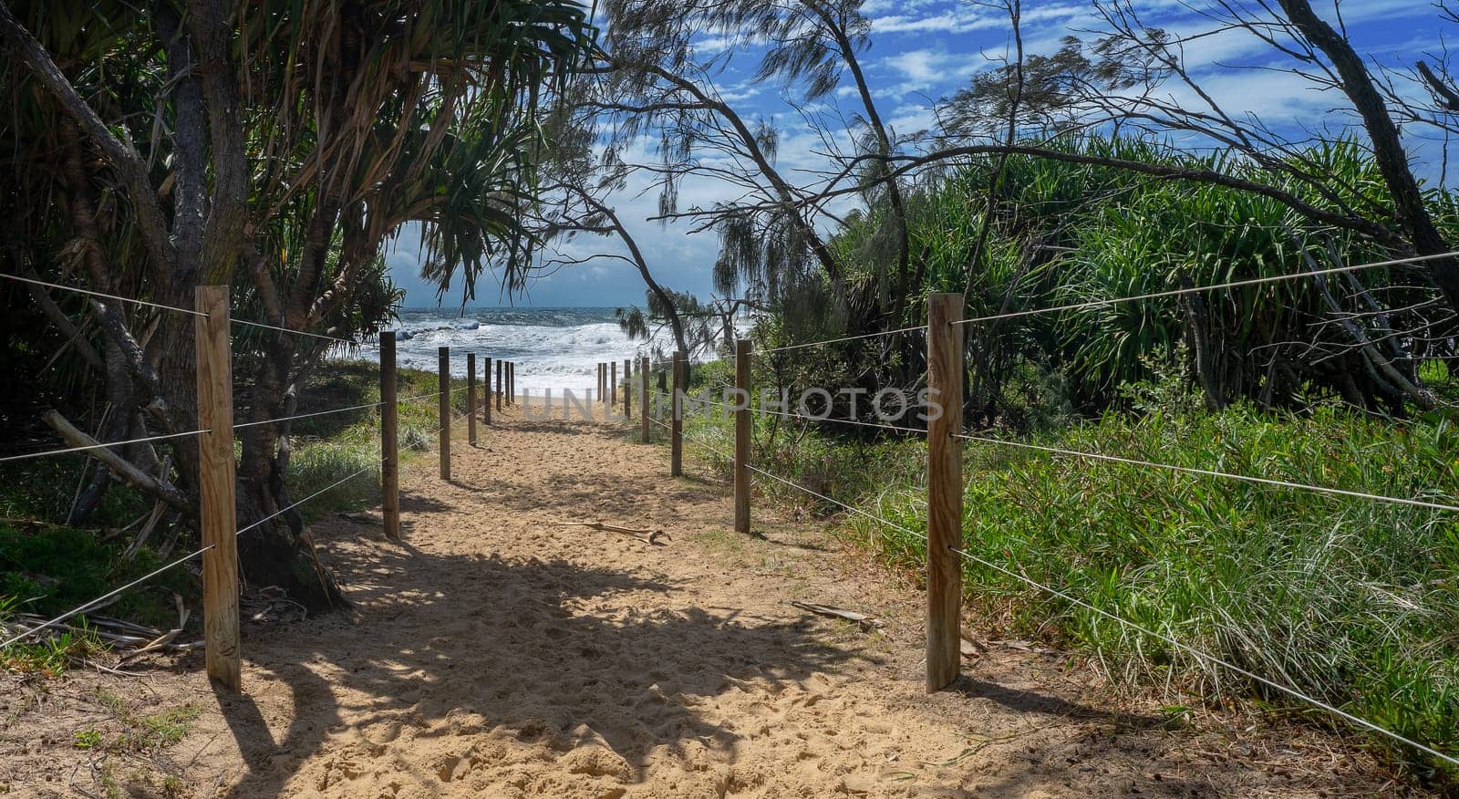 Public pathway to access the beach and surf at Warana Sunshine Coast Queensland on a very stormy cyclonic and rough day