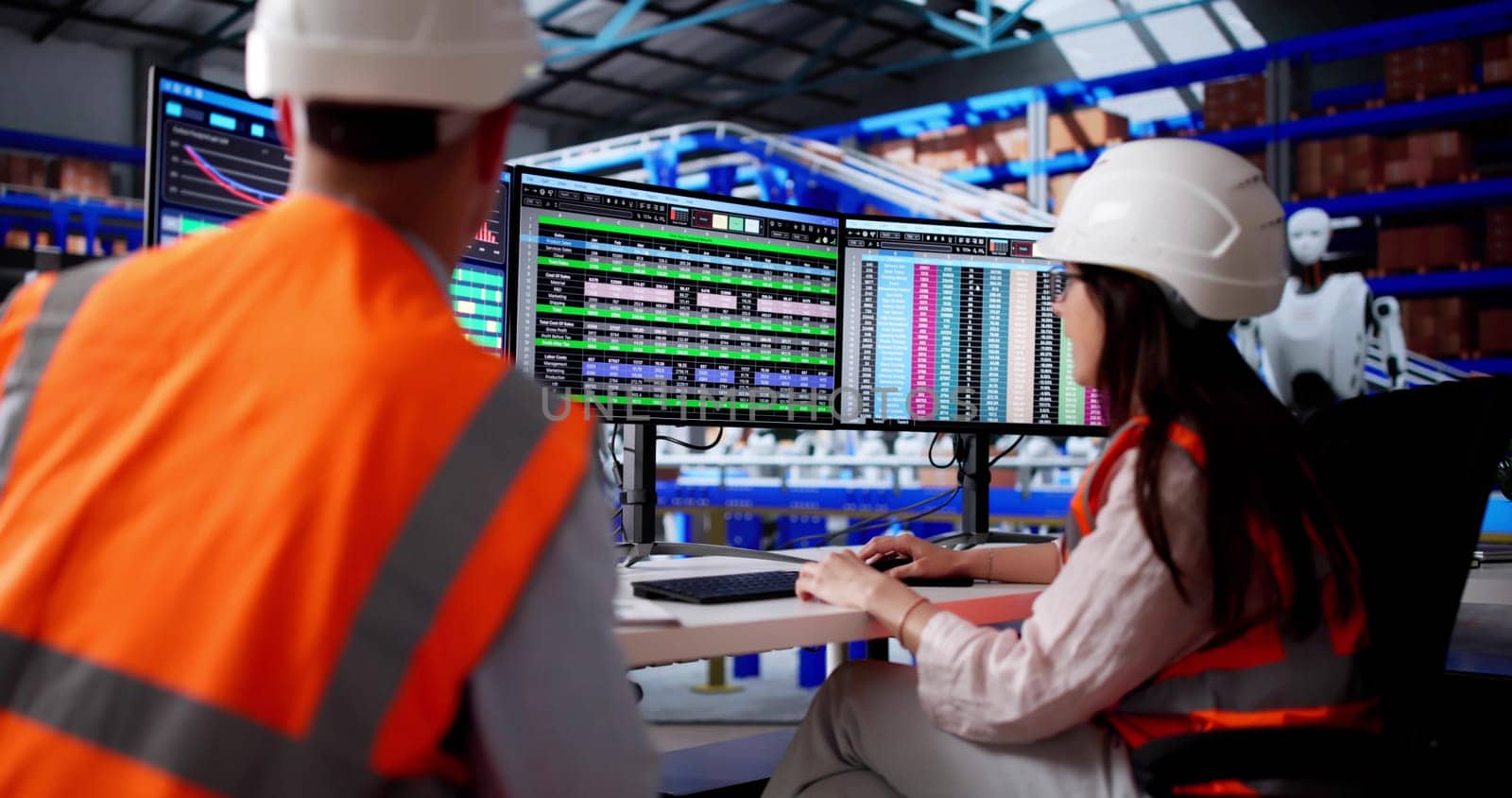 Warehouse Manager Meticulously Studies Spreadsheets On Desktop Computer Screen.