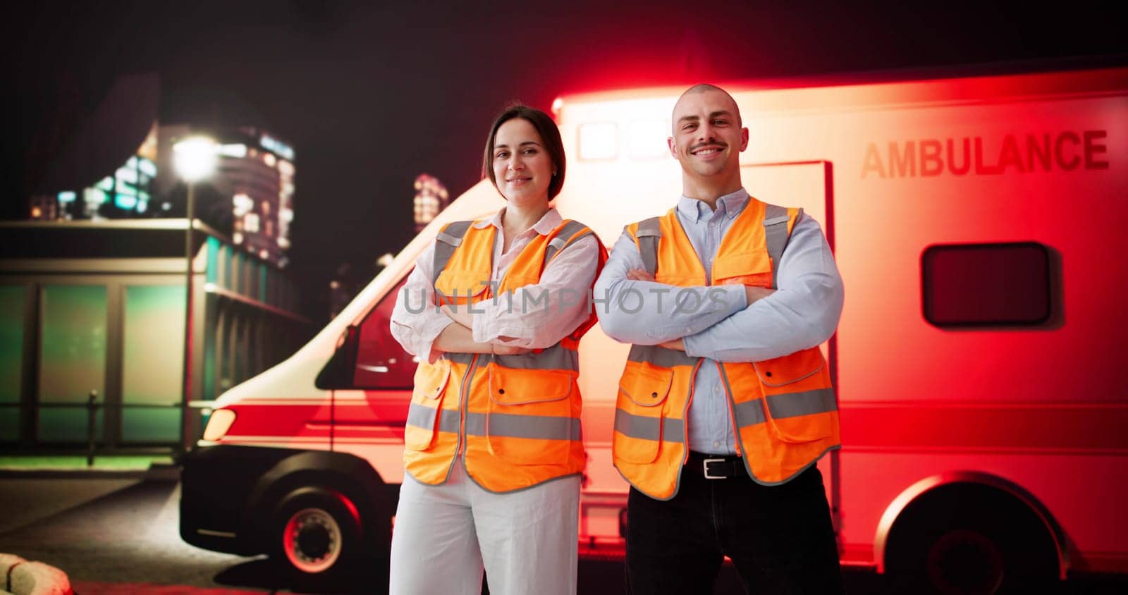 Emergency Paramedics From Rescue Service Provide First Aid At Night.