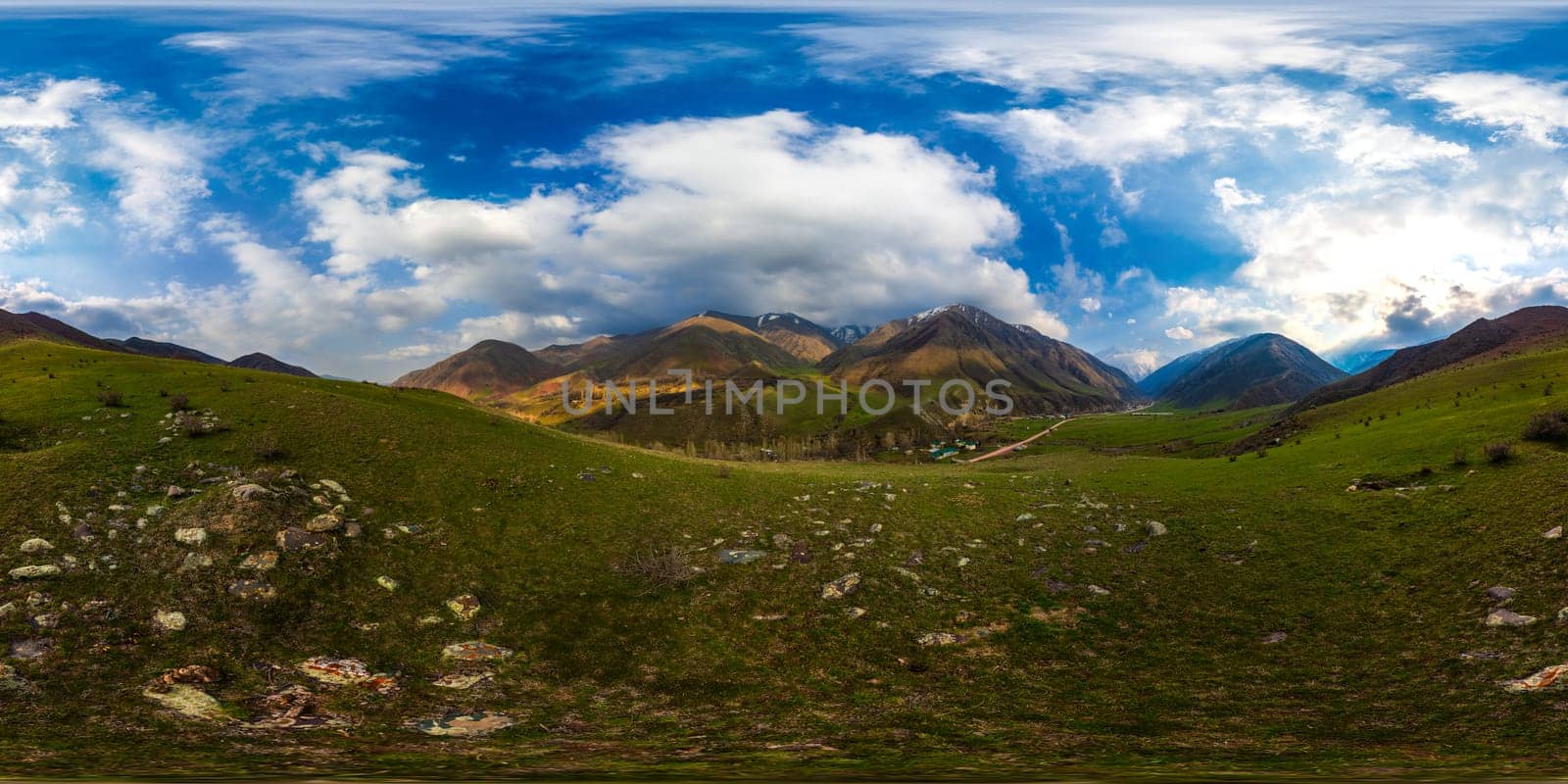 Full Spherical HDRi panorama of springtime highland pasture in mountains at sunny day in equirectangular projection.
