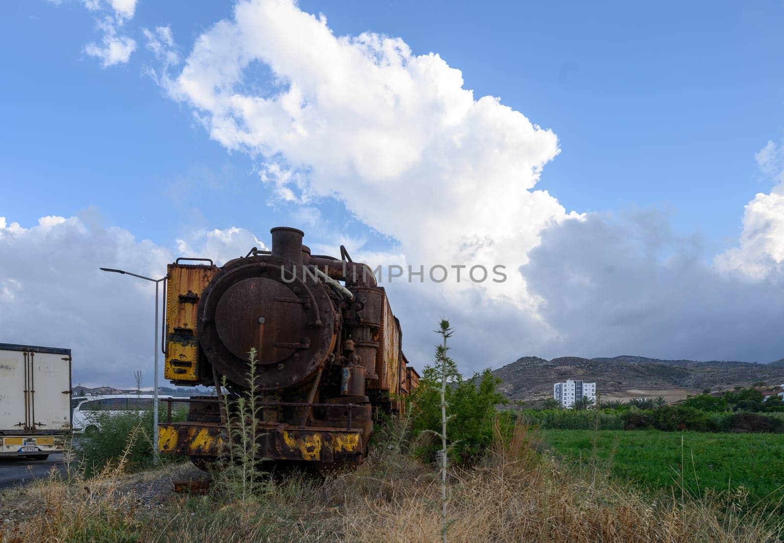 Vintage Yellow English Steam Locomotive Displayed in Cyprus