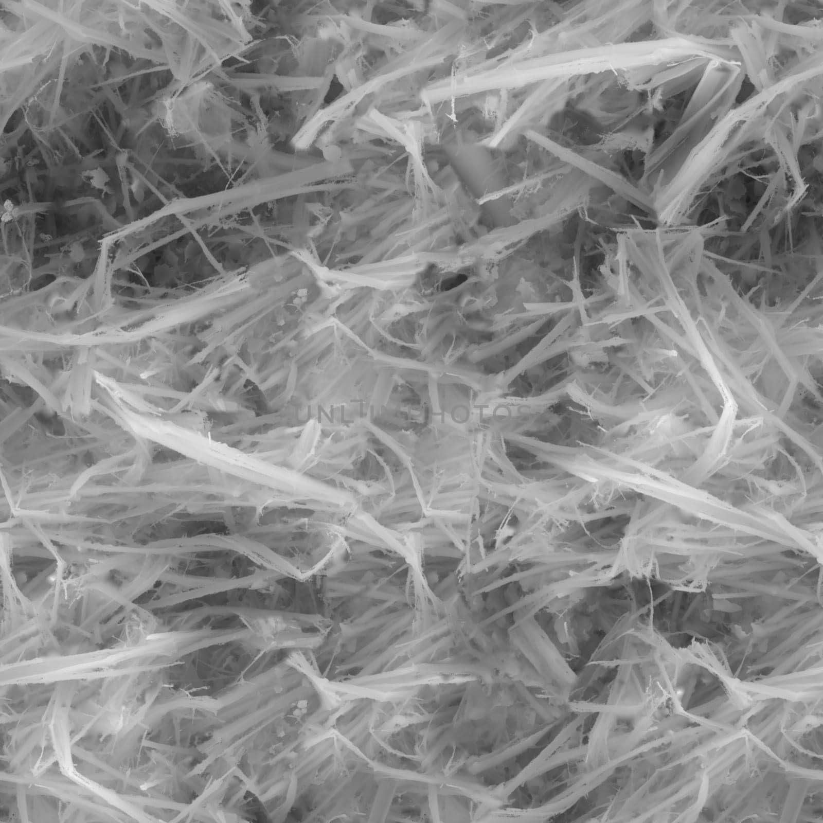Microscopic view of dangerous white asbestos fibers creating a textured background, highlighting the health risks associated with this material