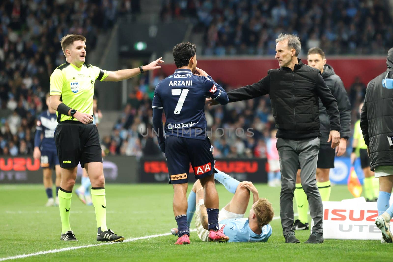 MELBOURNE, AUSTRALIA - MAY 31: Aurelio Vidmar of Melbourne City disputes with Daniel Arzani of Melbourne Victory during the A-League Men's Grand Final match between Melbourne City and Melbourne Victory at AAMI Park on May 31, 2025, in Melbourne, Australia.