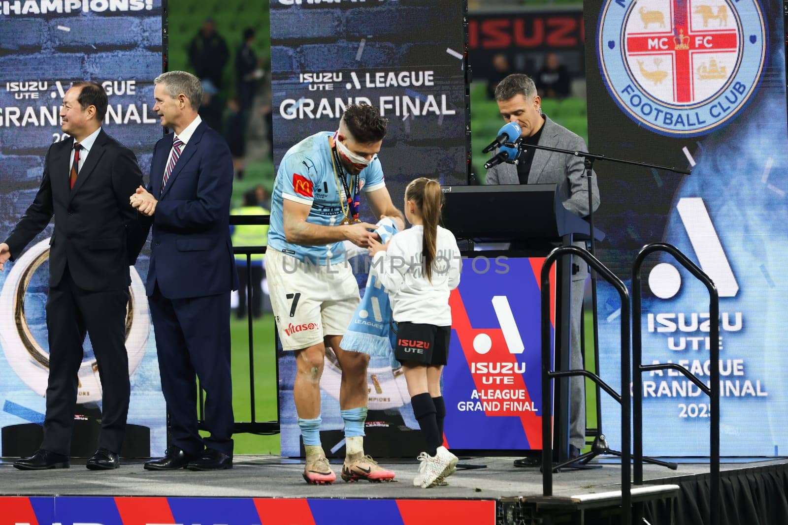 MELBOURNE, AUSTRALIA - MAY 31: Mathew Leckie of Melbourne City receives the Joe Marston medal after winning the A-League Men's Grand Final match between Melbourne City and Melbourne Victory at AAMI Park on May 31, 2025, in Melbourne, Australia.