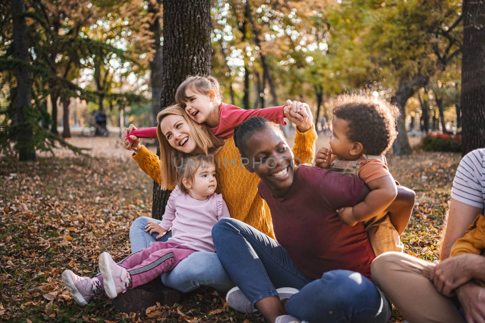 Autumn Embrace: A Tapestry of Family Love.