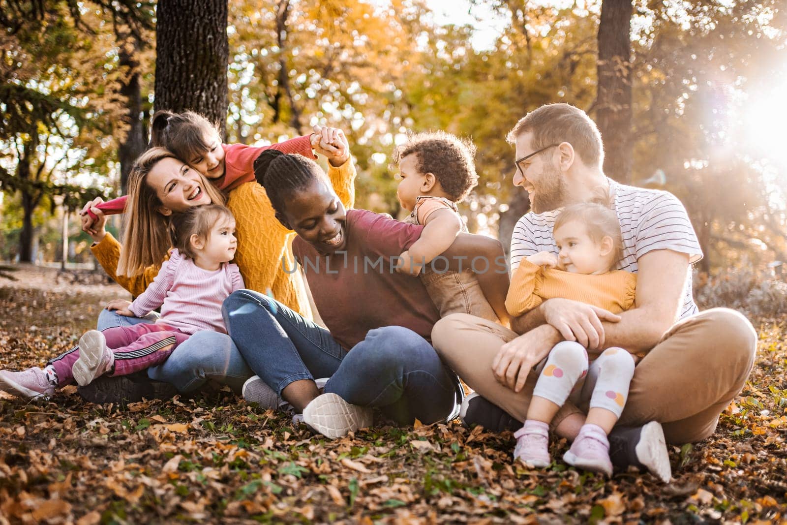 Autumn Embrace: A Tapestry of Family Love.
