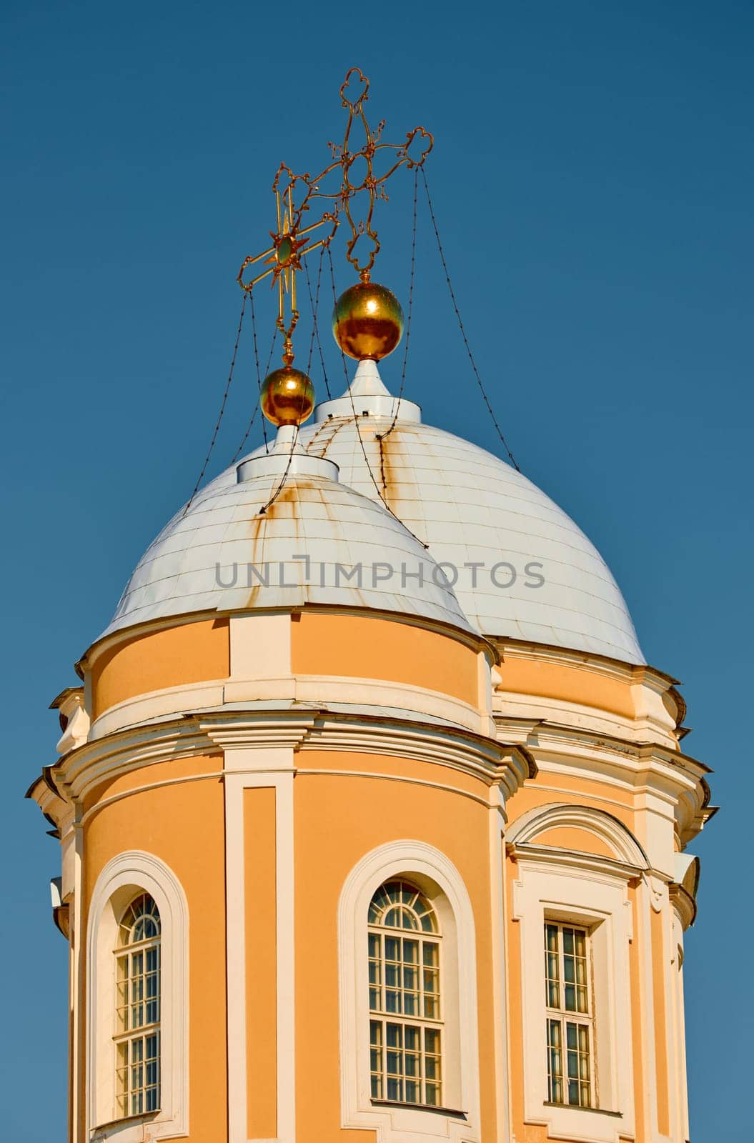 domes with golden crosses of the Prince Vladimir Cathedral on a sunny day. High quality photo
