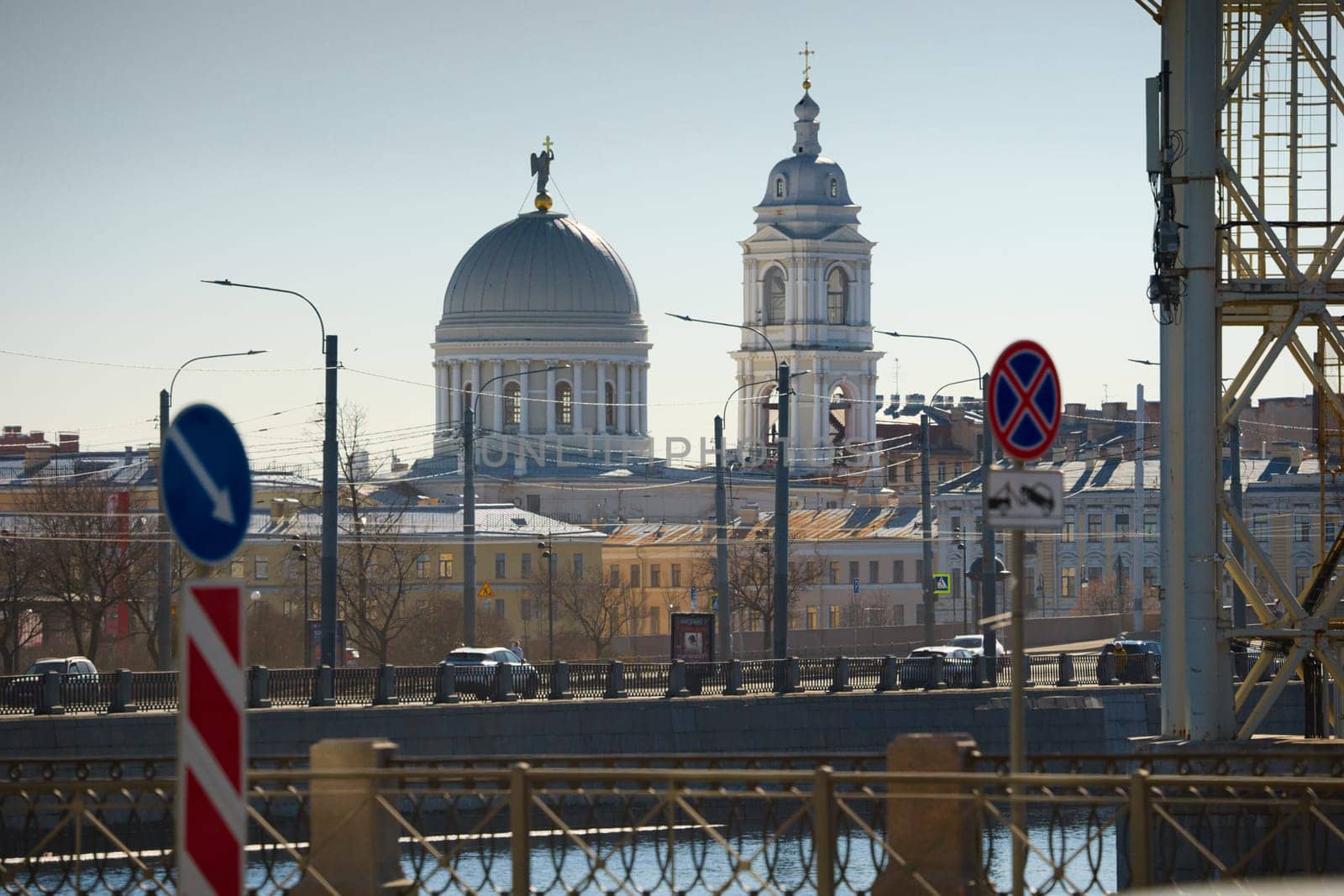 Russia, St.Petersburg, 27 March 2025: Church of St. Catherine the Great Martyr on a sunny spring day, Makarov Embankment, ice drift on the Neva River. High quality photo