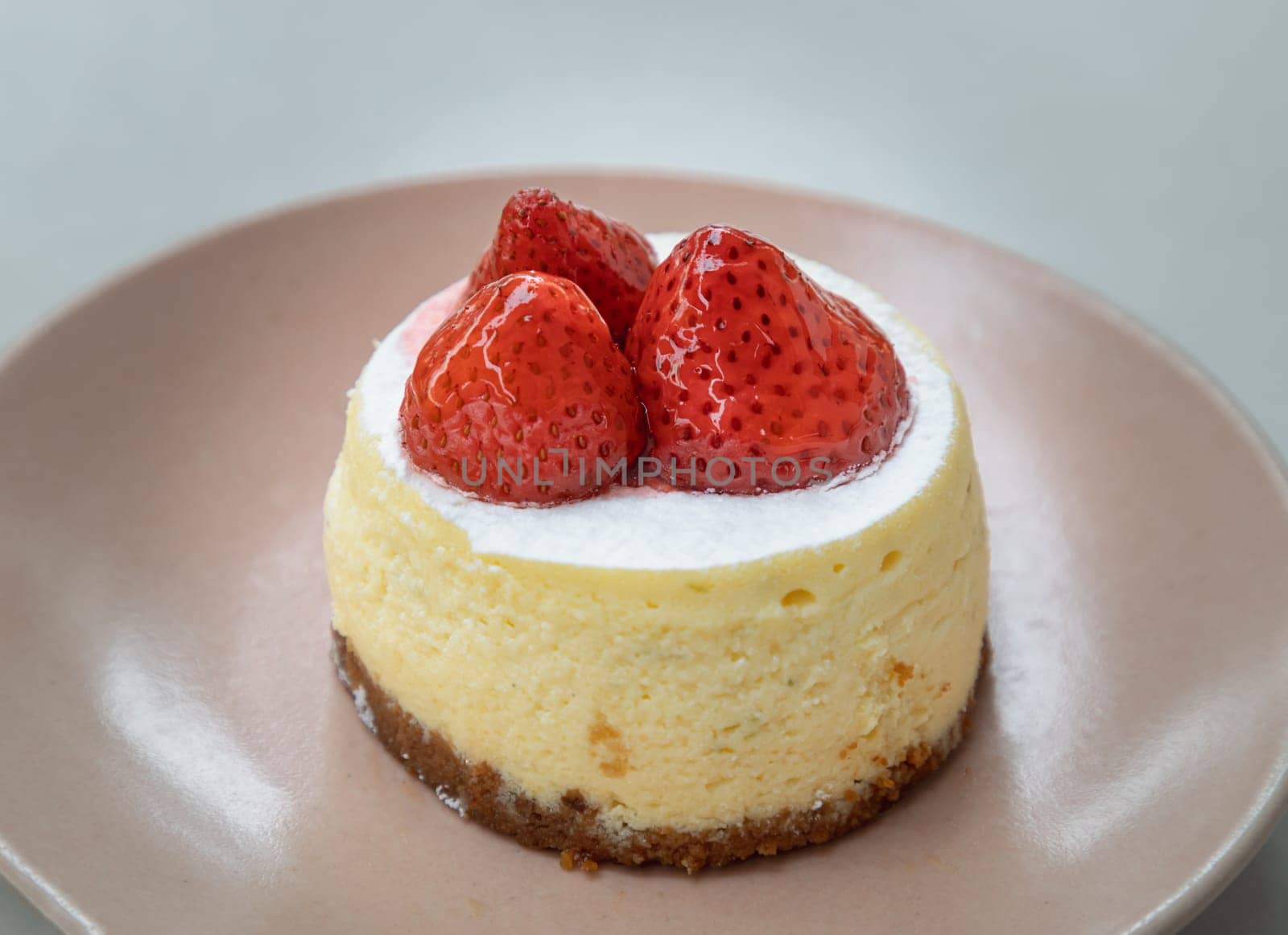 Delicious homemade Strawberry Cheesecake. Tasty cheesecake with strawberries, use it as your Wallpaper, Poster and Space for text, Selective focus.