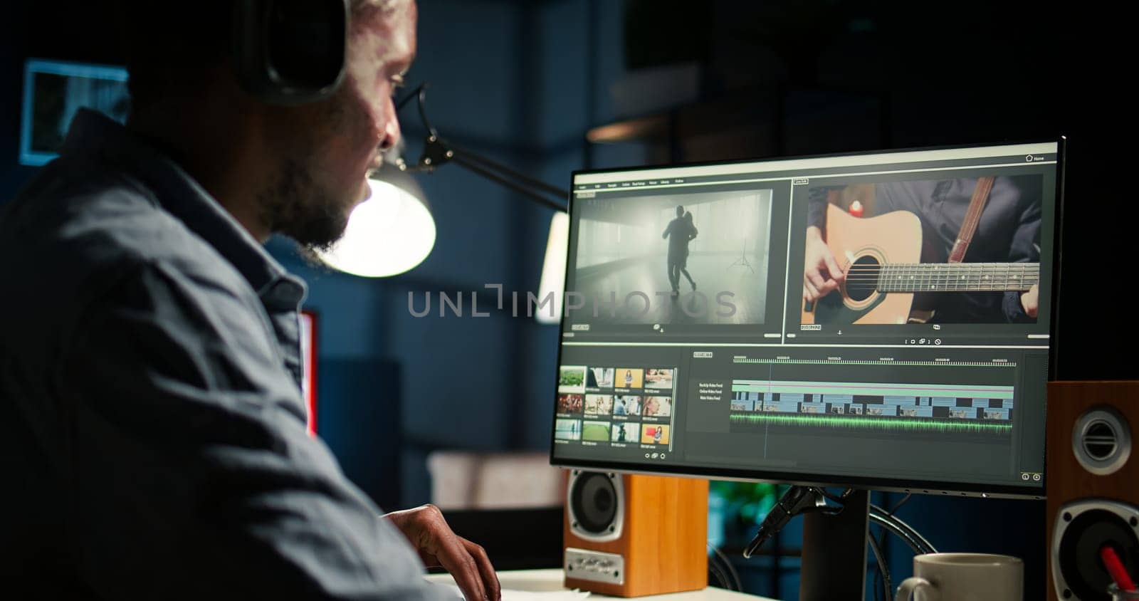Young man video creator working on editing a movie montage project, multitasking with dual monitors. Male footage editor starting the cinematic creative process, film editing industry. Camera A.