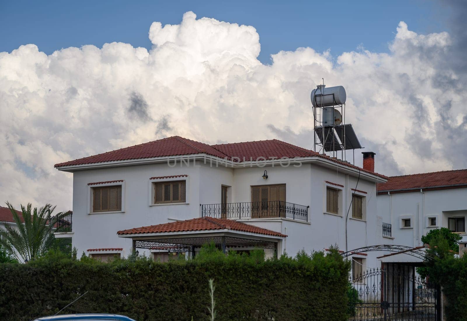 Charming old houses with wooden balconies and tiled roofs in the historic town of Lefke, Northern Cyprus.