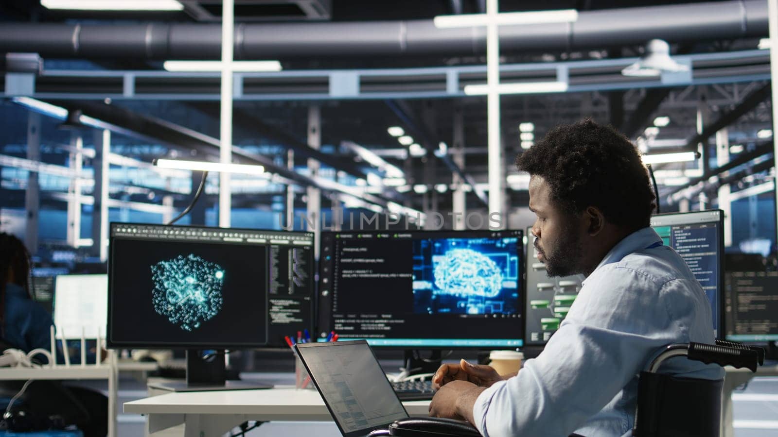 Data center computer scientist in wheelchair using AI node tree software to minimize system downtime. Server hub employee in disability using artificial intelligence visual programming tool, camera A