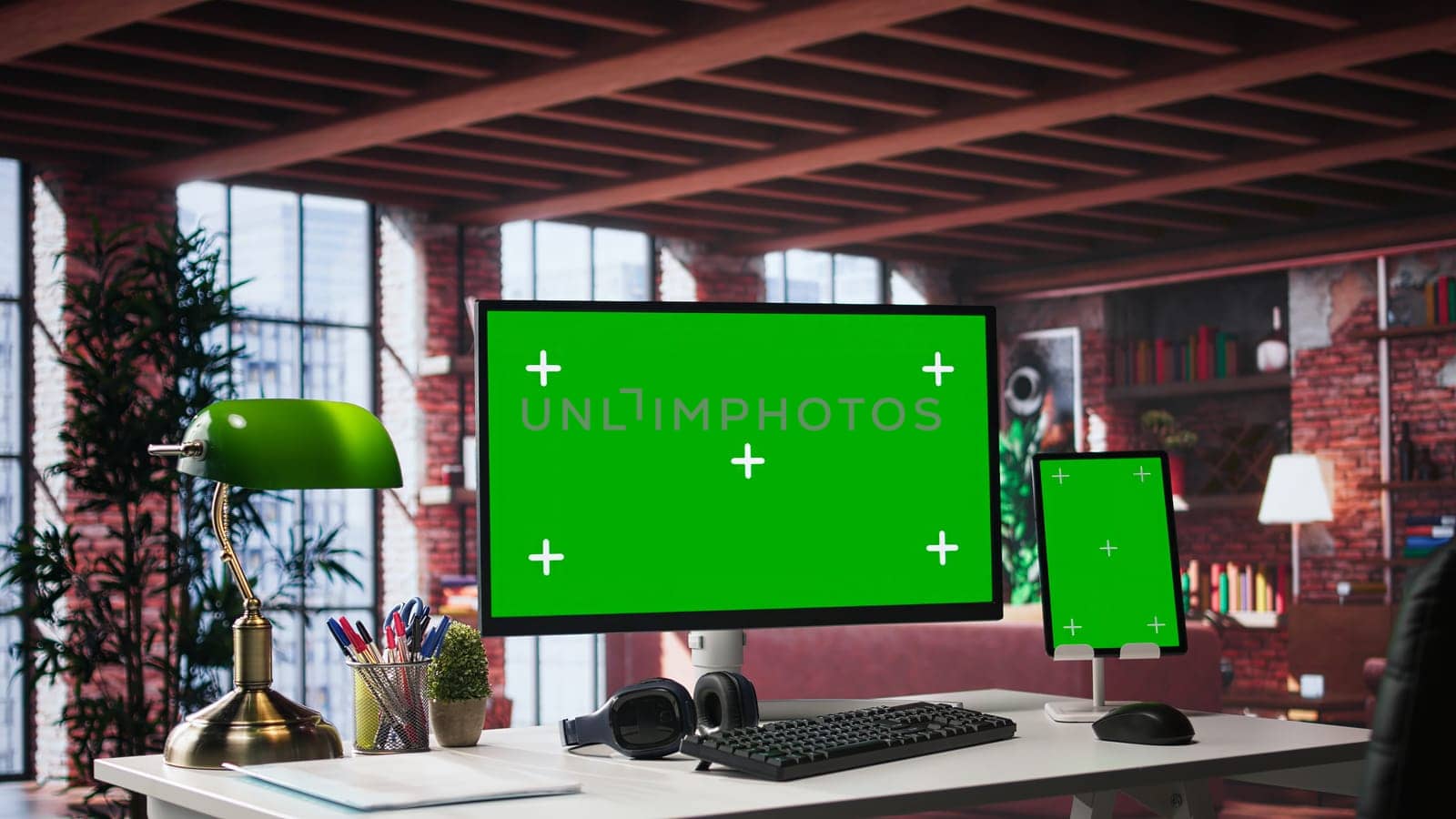 Isolated screen with chroma key in glamorous urban home office. Bright open workspace combines refined luxury with organized comfort, offering a tasteful backdrop for professional work.