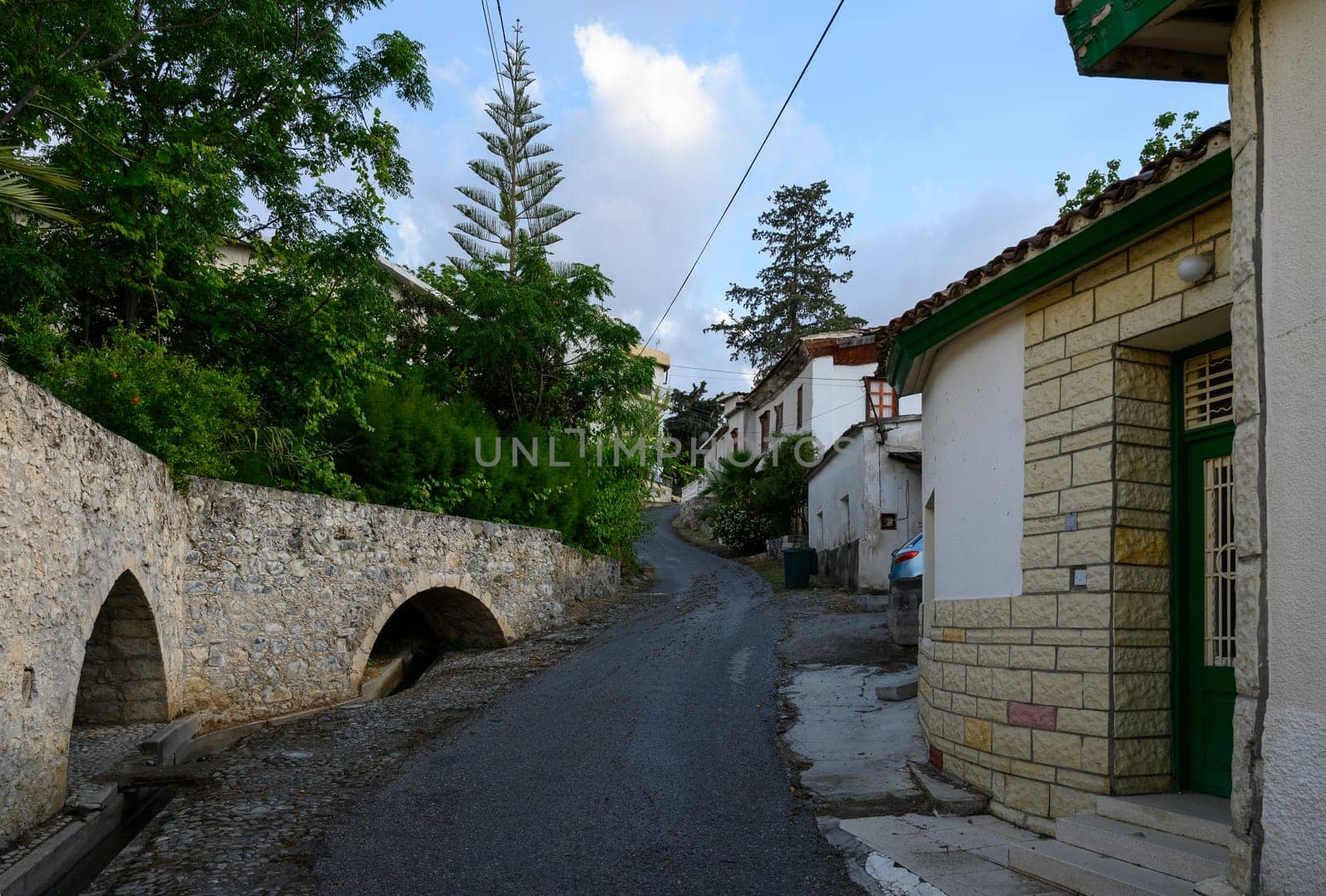 Historic stone viaduct in Lefke, Cyprus, showcasing old engineering and Mediterranean landscape charm.