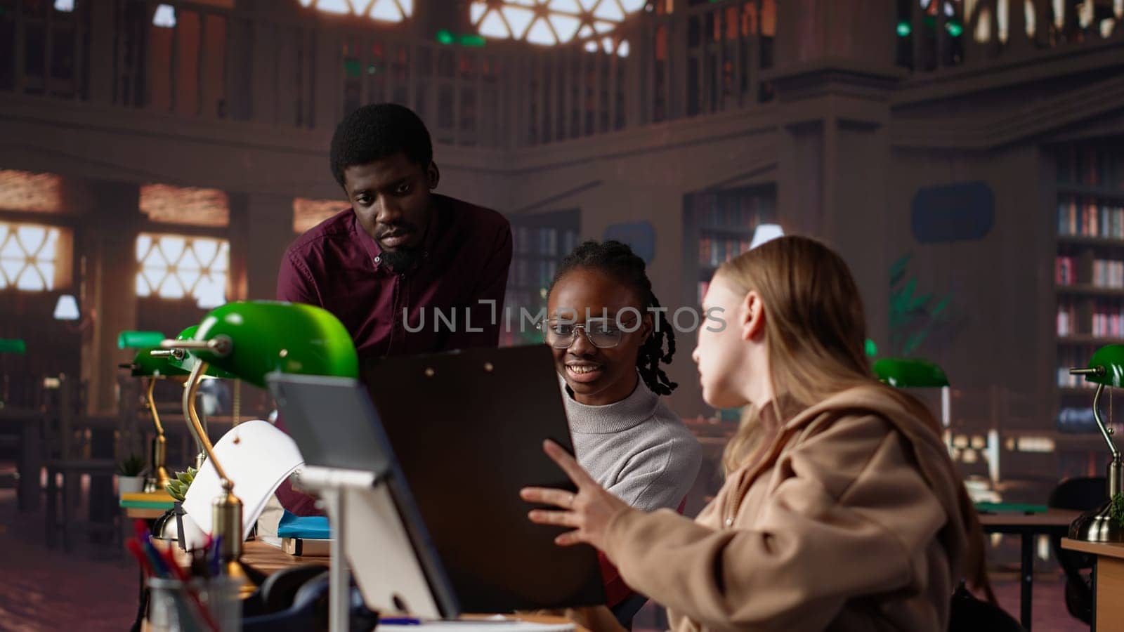 Student makes exam preparations at the university library with classmates, doing research to complete handwritten class notes. Girl collecting information for academic citations. Camera A.