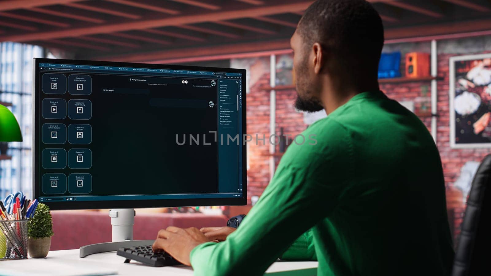 Black male freelancer at home uses AI chatbot for task completion, automation and machine learning. Young adult uses artificial intelligence to generate new ideas with prompts. Camera A.