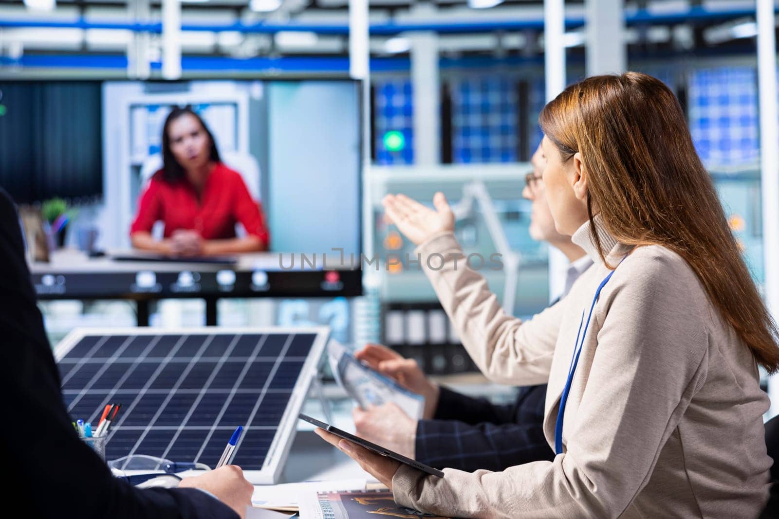 Investors evaluating photovoltaics factory production efficiency during online videocall before investing. Shareholders doing teleconference meeting with managers to ask technical questions