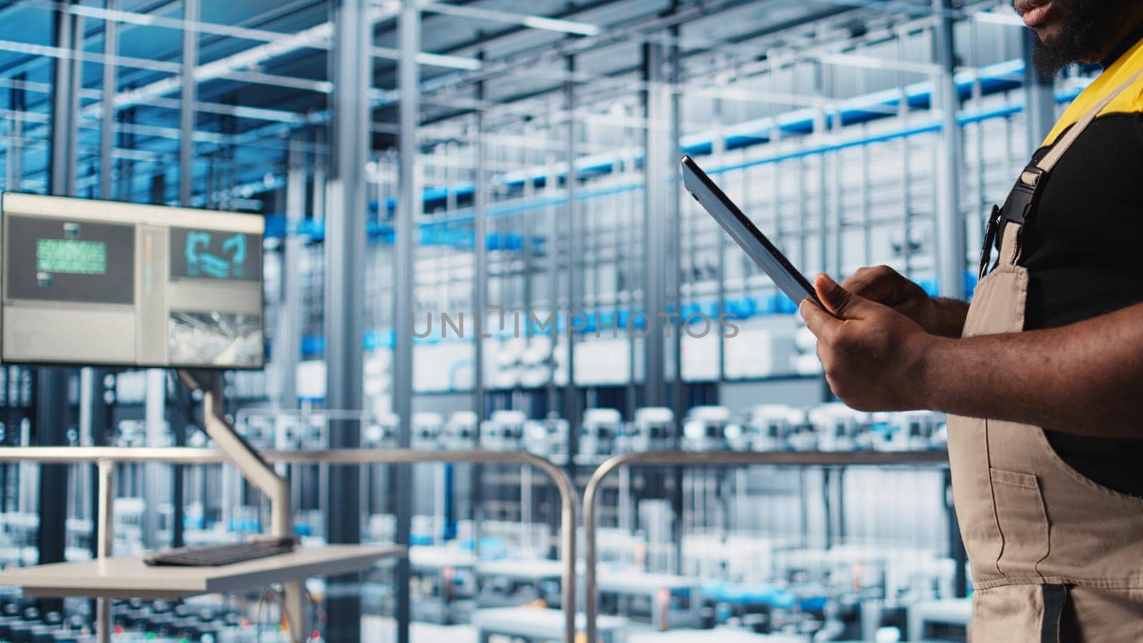 Industry 4.0 photovoltaics plant admin using digital device app to maximize solar energy generation, closeup. Specialist overseeing solar panels smart factory machinery, camera A