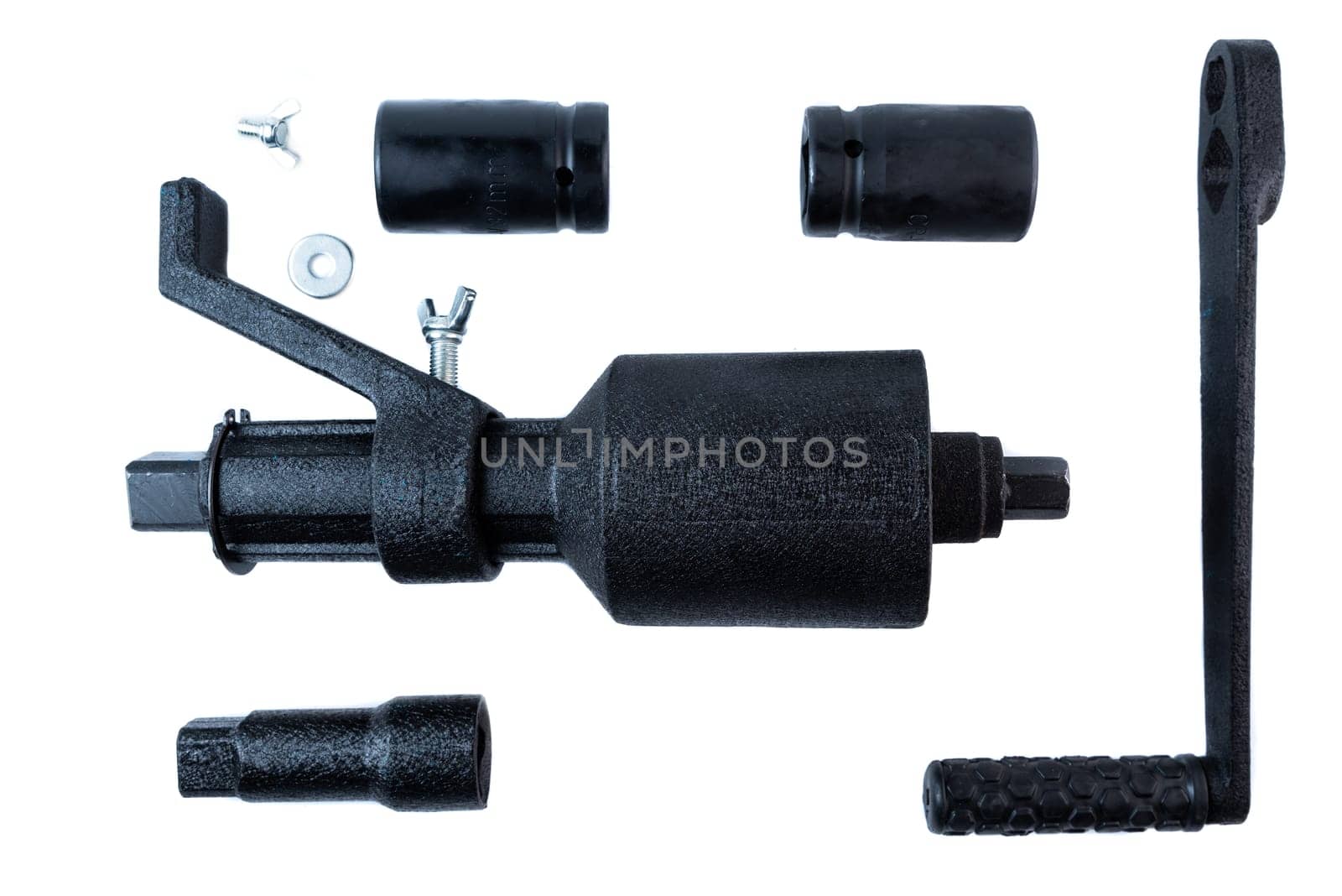 Disassembled manual impact wrench tool kit with handle, sockets, fasteners, and drive mechanism on white background