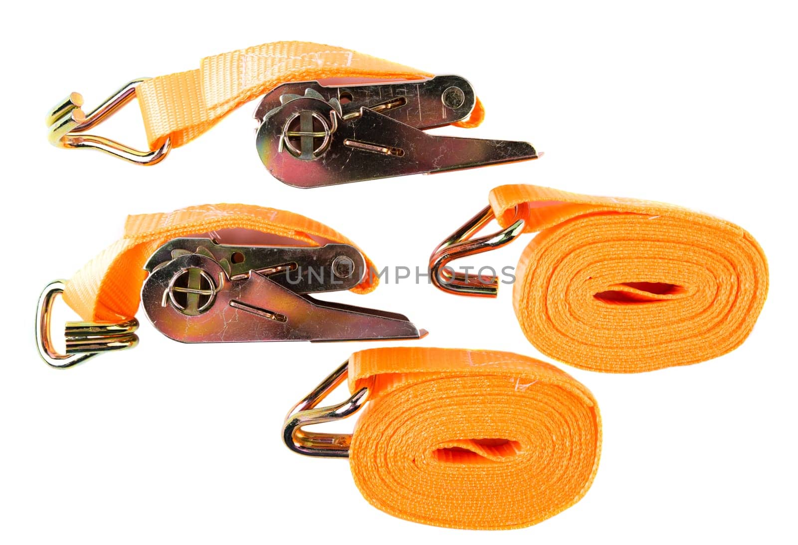 Top view of two coiled orange cargo straps and two ratchets with hooks, arranged on white background. Clean product layout for catalog or store listing.
