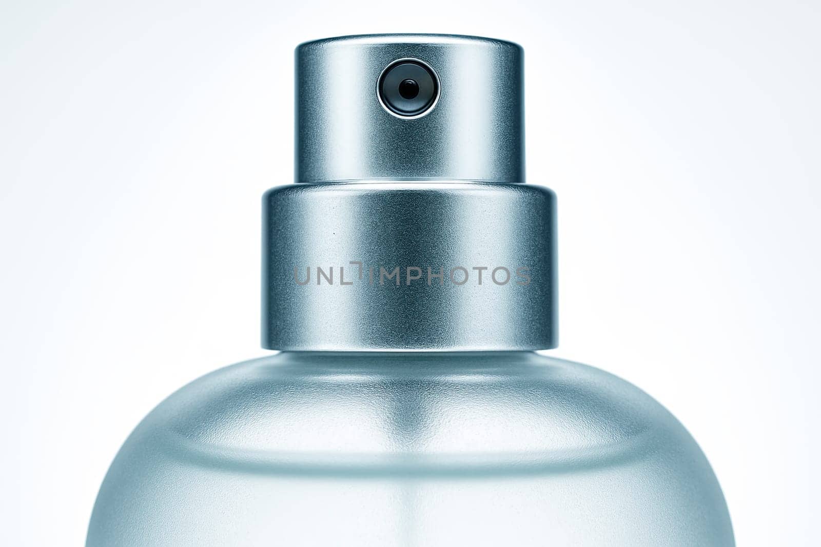 Close-Up Frosted Glass Perfume Atomizer with Cool Ring-Light Highlights