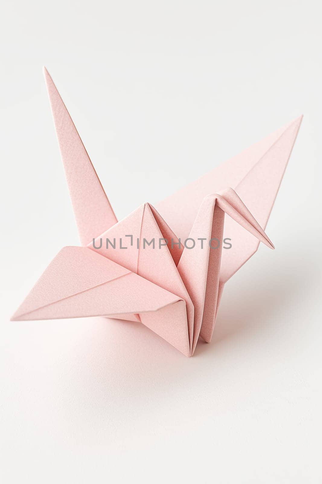 Focus-Stack Macro of Pastel Origami Crane on Bright White Background