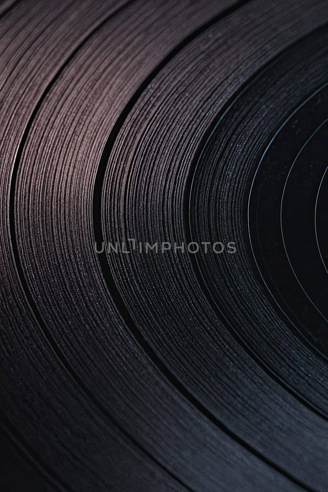 Macro of Vintage Vinyl Record Grooves under Soft Pastel Light