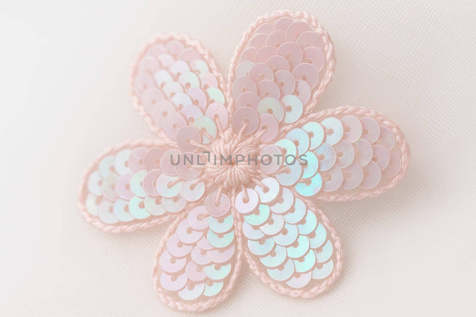 Macro of Pastel Sequin Embroidery Flower with Soft High-Key