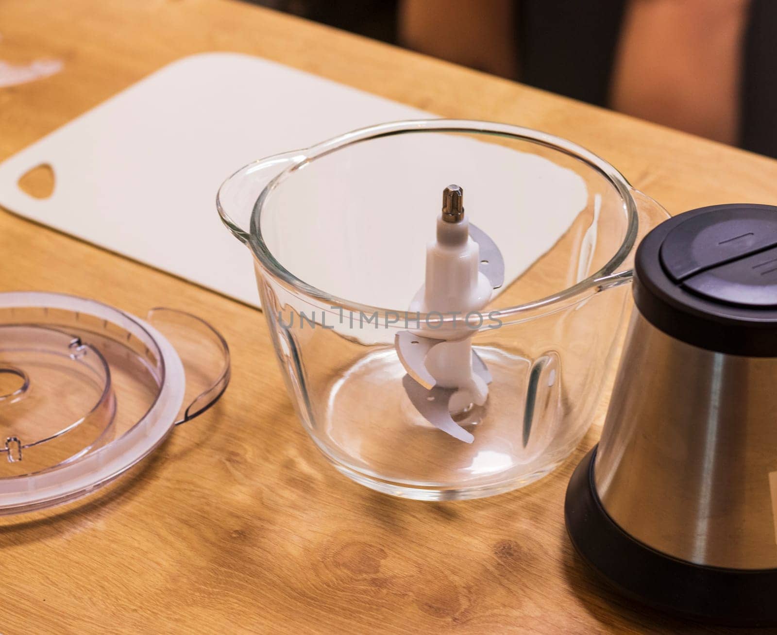 Dismantled electrical kitchen chopper on the counter top