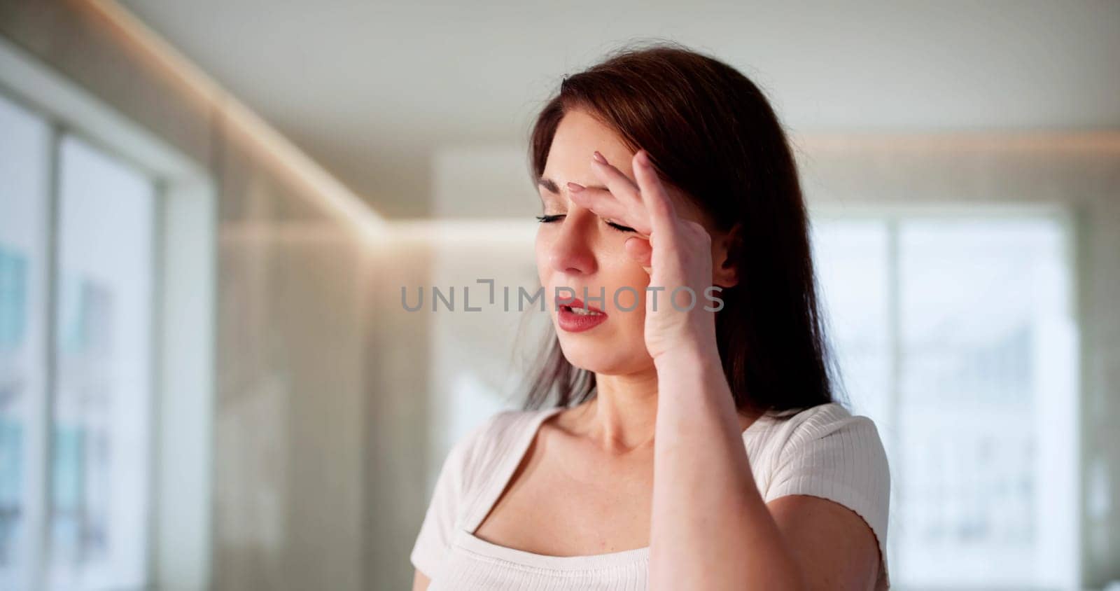 .The Tired Woman Rubbed Her Eye, Tired Of The Inflammation. Possible Professions: Ophthalmologist, Optometrist