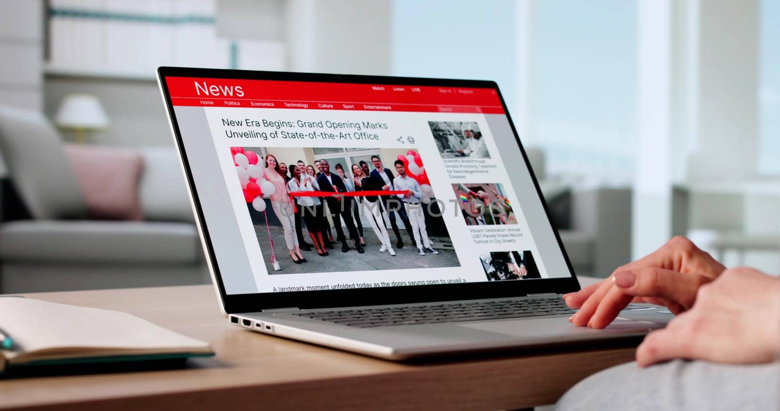 Female Journalist Researching News Articles Online For Corporate Marketing Agency