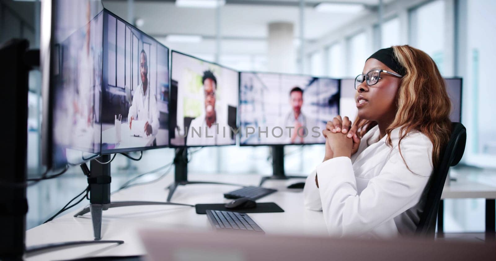 Online Radiology Conference: African American Doctor Chatting With Colleagues
