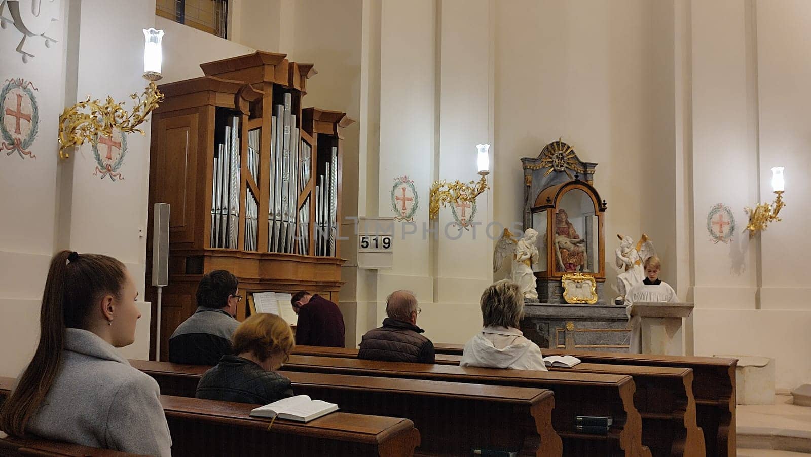 October 22 2024 Hradec Kralove Czech Republic Europe Kralov region, Kralovehradecky kraj. Church service congregation. High quality photo editorial people travel tourists tourism shotlisttravel place destination objects culture tradition architecture indoor girl woman