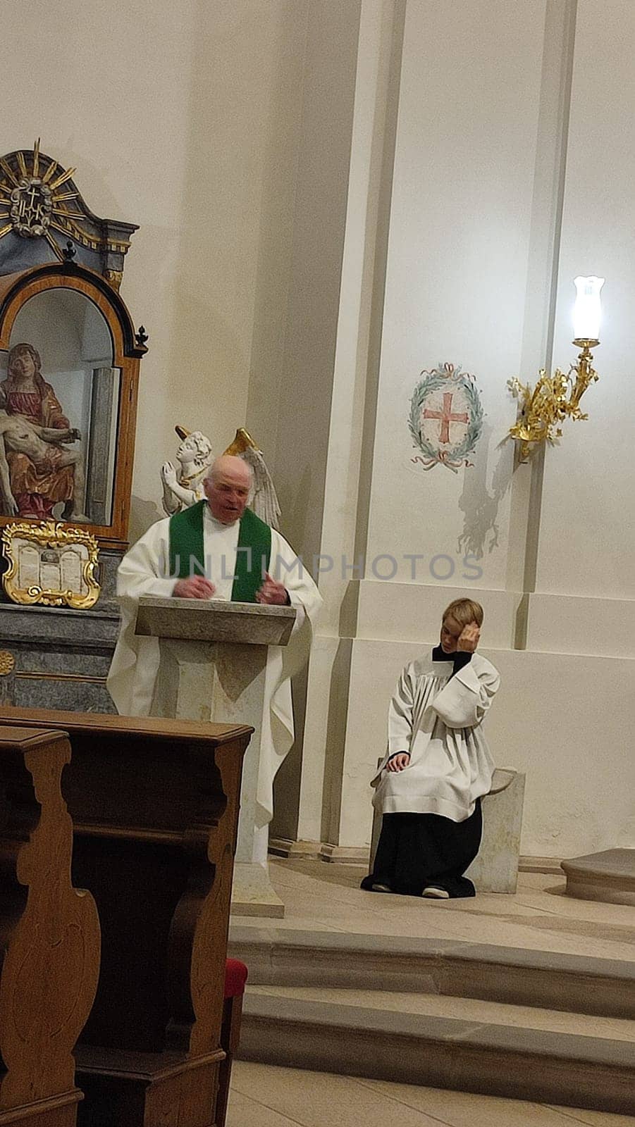 October 22 2024 Hradec Kralove, Czech Republic Europe, Kralov region, Kralovehradecky kraj Priest altar assistant. High quality photomen people architecture religion building culture tradition editorial shotlisttravel travel tourism