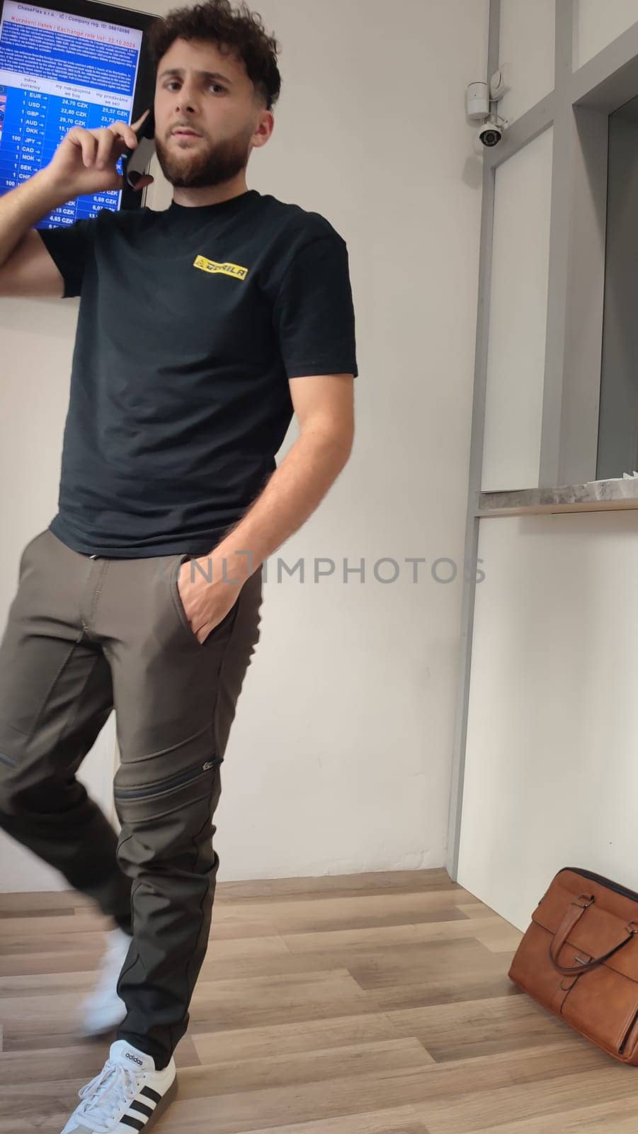 October 22 2024 Hradec Kralove, Czech Republic Europe, Kralov region, Kralovehradecky kraj, Phone casual outfit men editorial people travel tourists tourism shotlisttravel . High quality photo