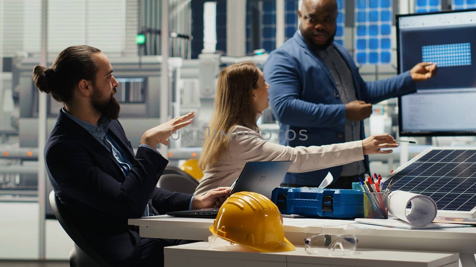 Cheerful managers doing handshake, celebrating expanding factory production. Happy factory shareholders shaking hands, congratulating themselves after determining investment strategy, camera B
