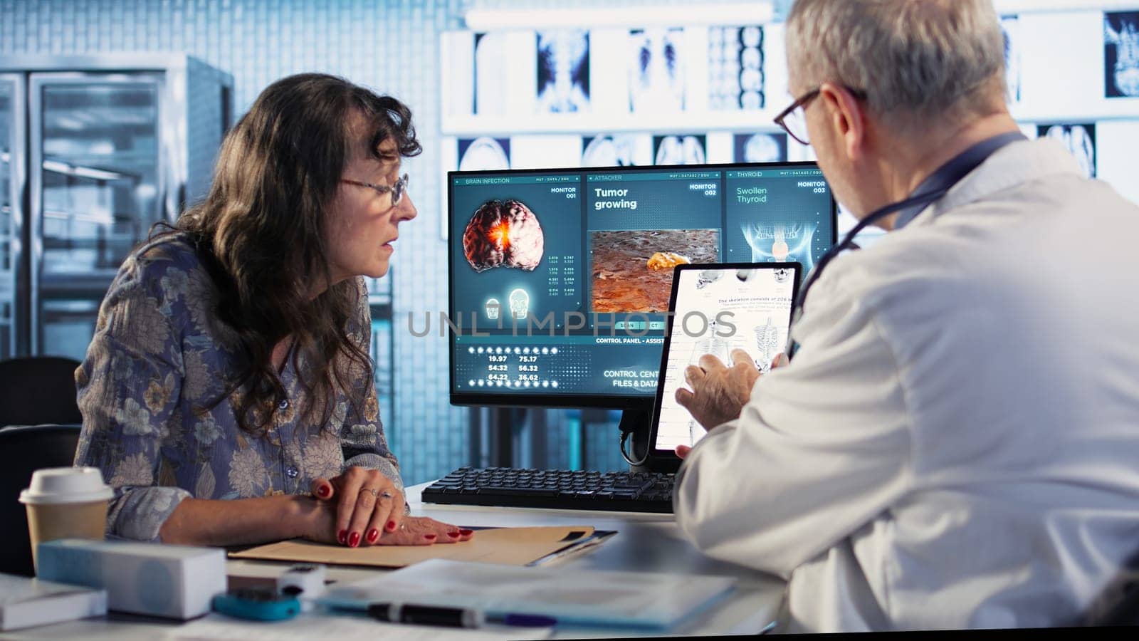 Healthcare professional sharing his expertise and interpreting the MRI scans results, offering advice and support to sick woman at checkup. Accurate diagnostics and patient care. Camera A.