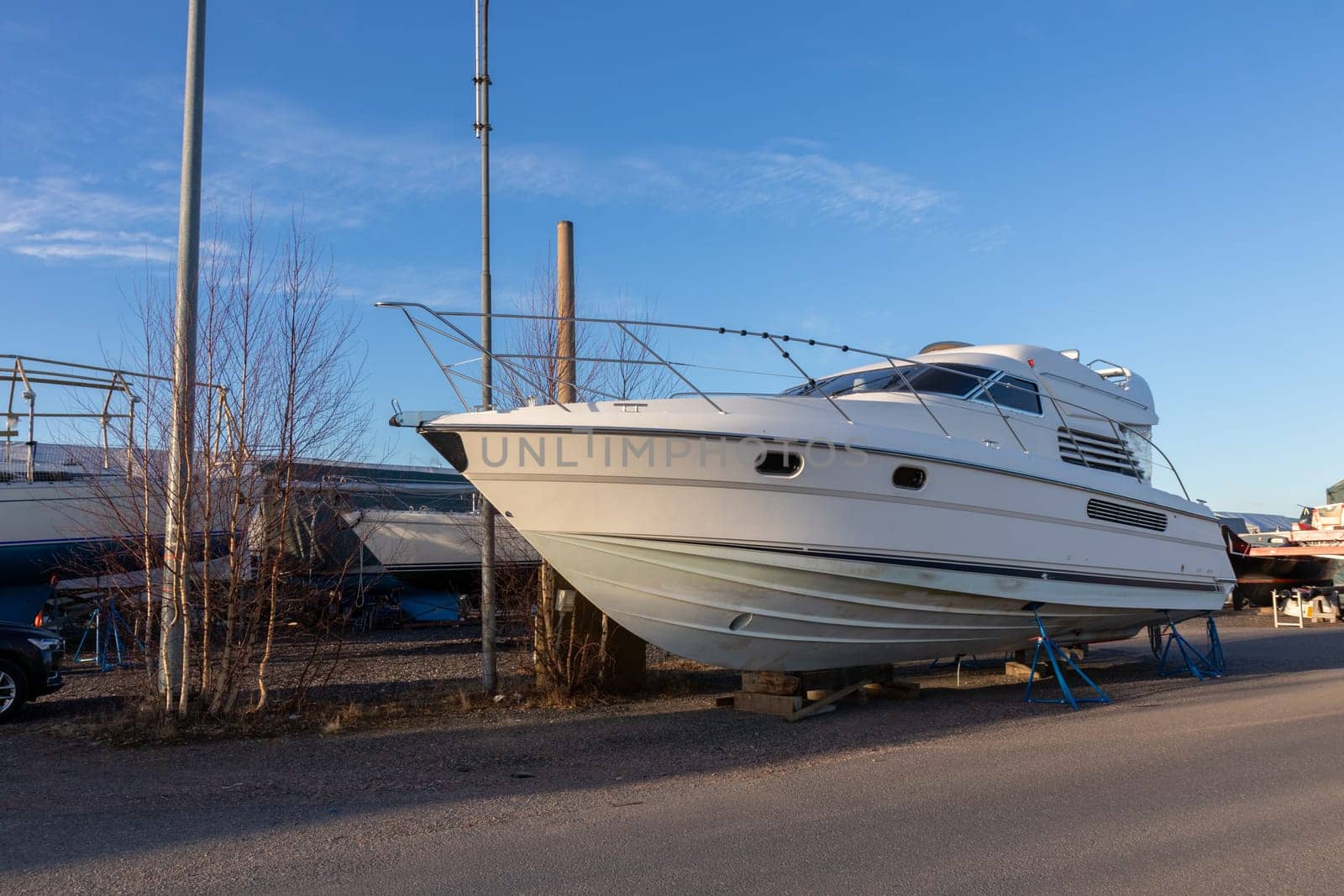 Boat stored out of the water for the winter, winter storage for the boat in Finland, Suomenoja, winterizing , short season in Northern country, cold conditions