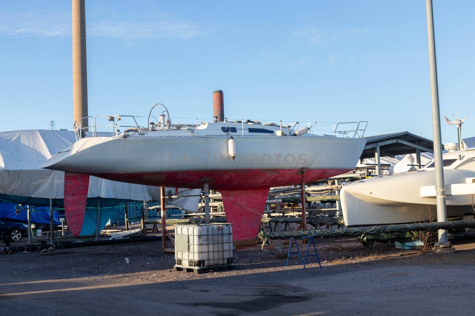 Sailboats stored out of the water for the winter, winter storage for the sailboat in Finland, Suomenoja, winterizing , short season in Northern country, cold conditions
