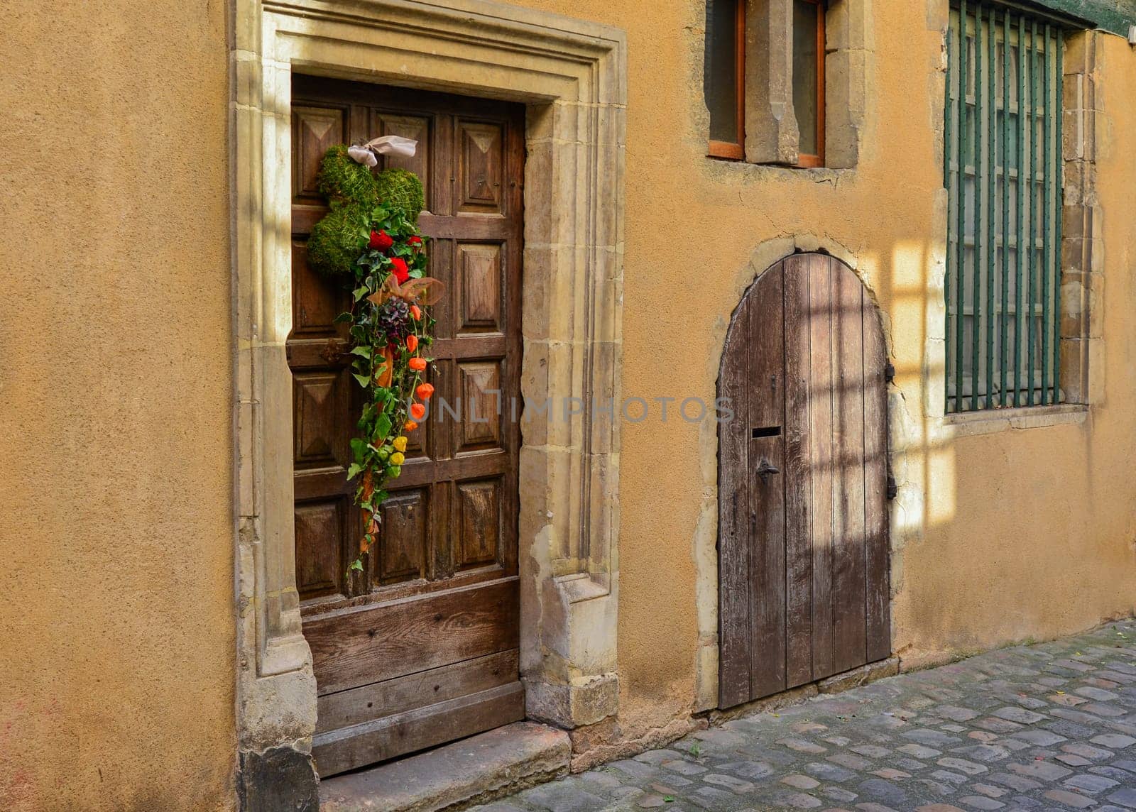Composition of autumn flowers on a wooden vintage door