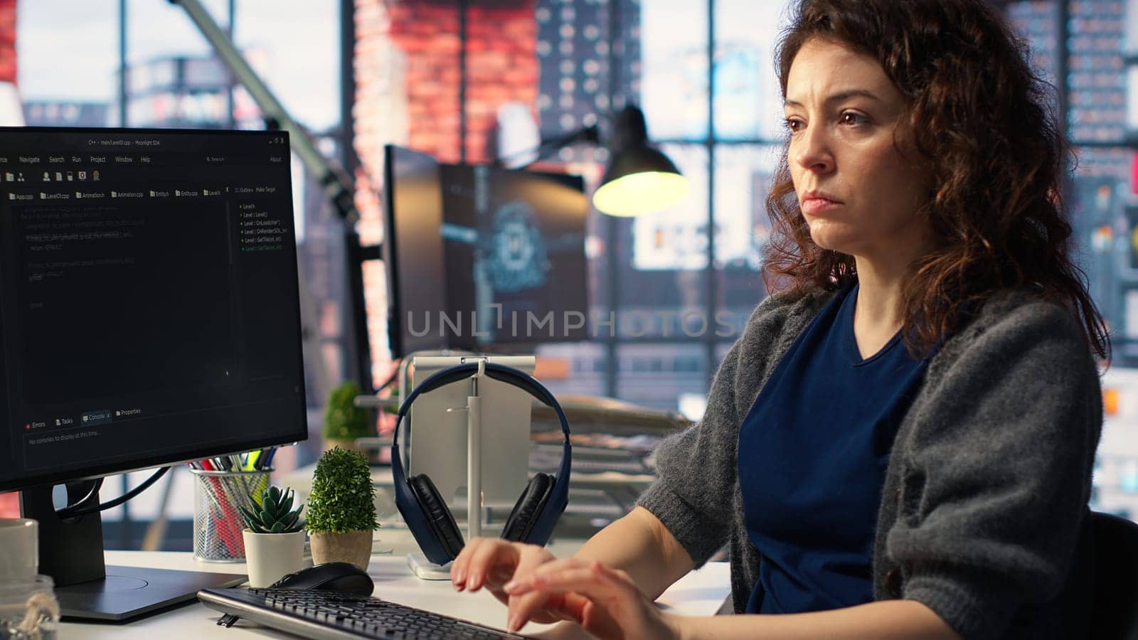 Admin writing code and doing maintenance on artificial intelligence neural networks computerized model. Woman tech support expert doing checkup on AI systems, data science. Camera B.