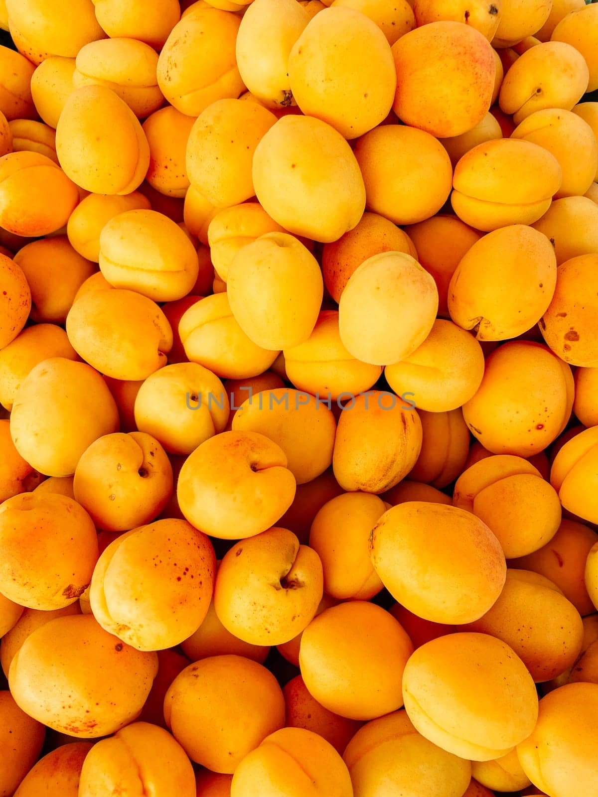 lots of ripe apricot berry fruits for food as background