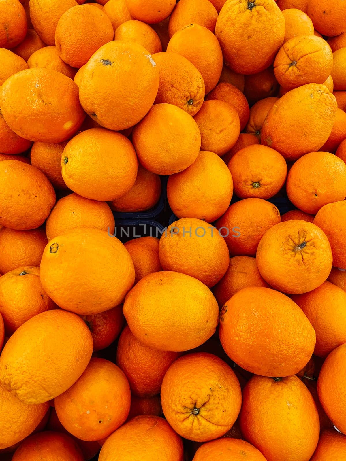 lots of ripe orange fruits for food as background