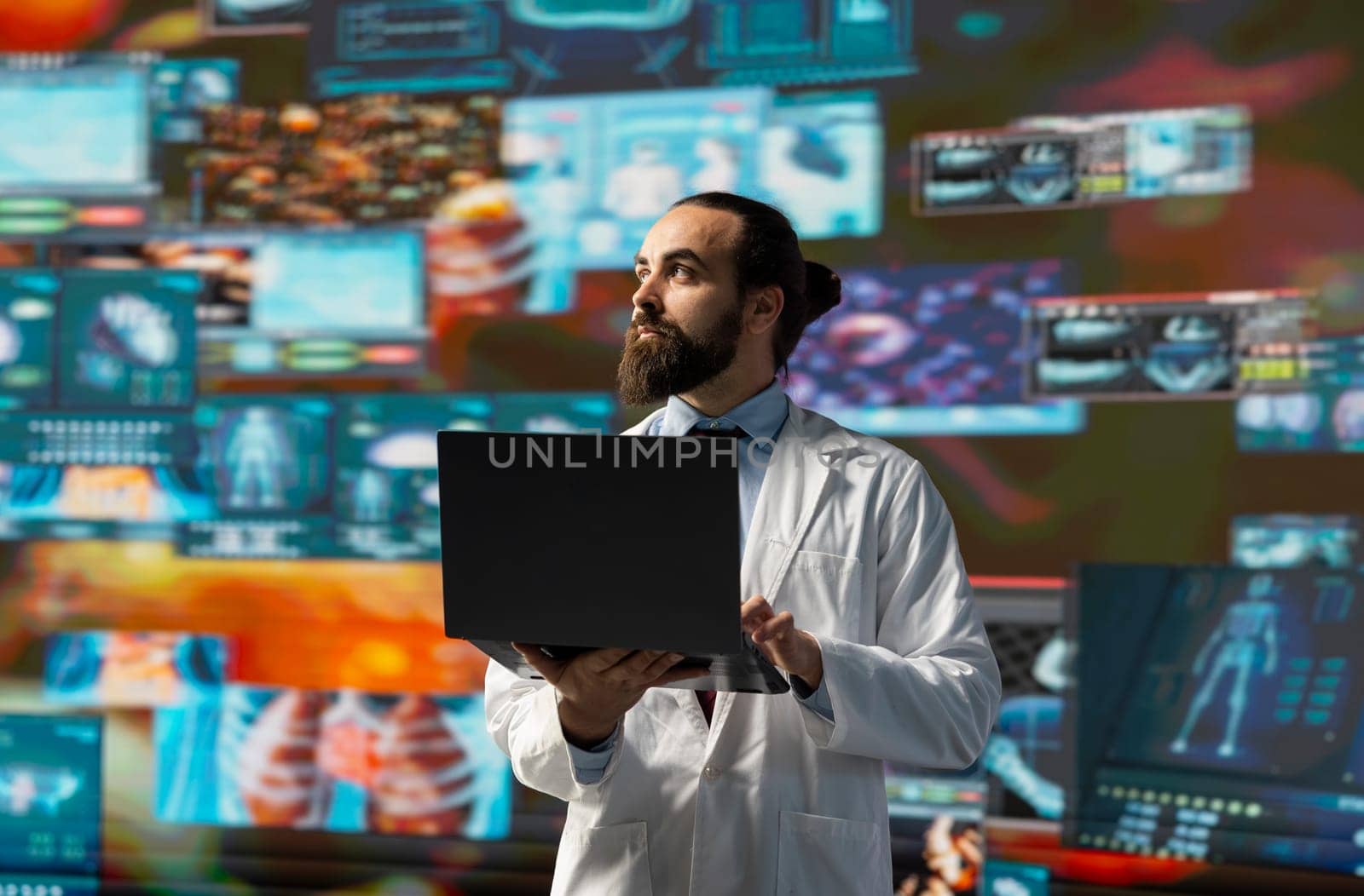 Young medic interacting with virtual health technology for telemedicine, connected systems and smart diagnostics in delivering global healthcare solutions. Biotechnology development.