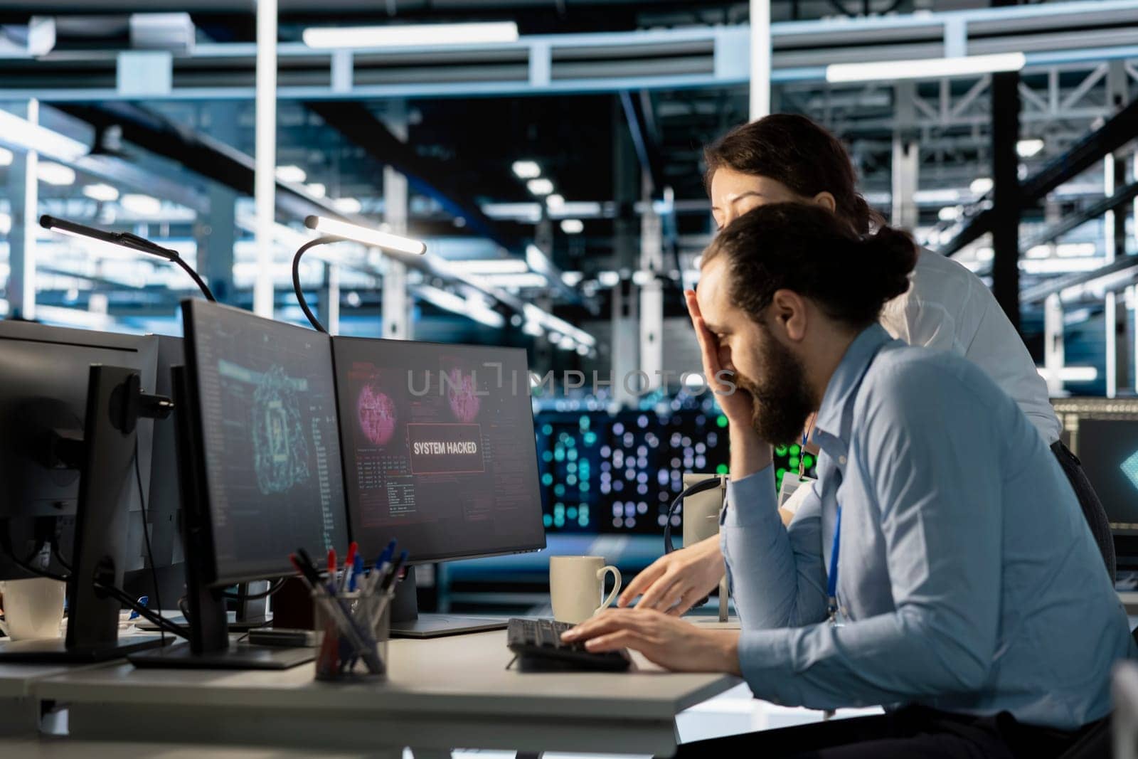 Server room colleagues cooperate to eliminate threats using artificial intelligence tools. Data center coworkers doing brainstorming, reviewing AI systems detecting irregular network activity patterns