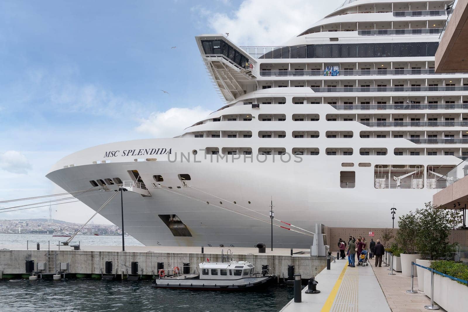 Istanbul, Turkey - May 5, 2023: MSC SPLENDIDA, Large cruise ship docked at terminal of Galataport, a mixed use development located along shore of Bosphorus strait, in Karakoy neighbourhood