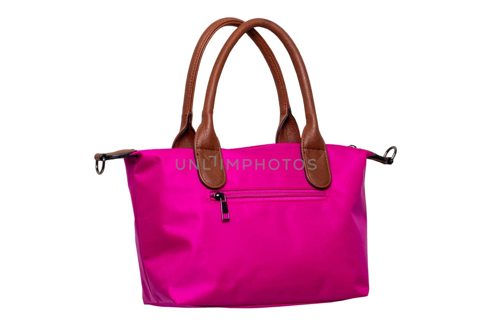 Stylish women's handbag. A fashionable female pink luxury handbag isolated on white. Fashionable womans accessories. Advertising.