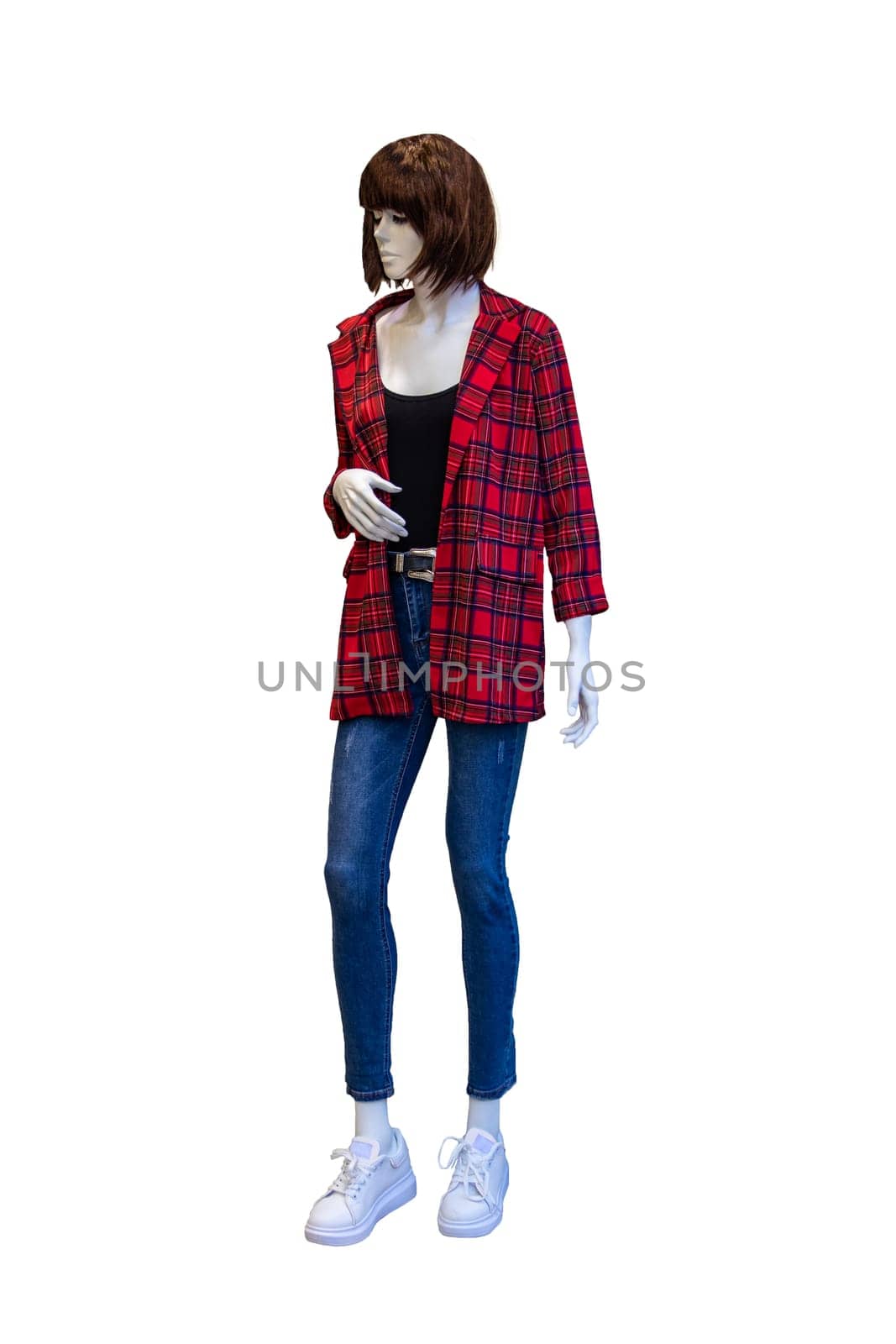 Female full length mannequin wearing a denim jeans, a red checked jacket, a black shirt and white sneaker isolated on white background. Woman with casual fashion.
