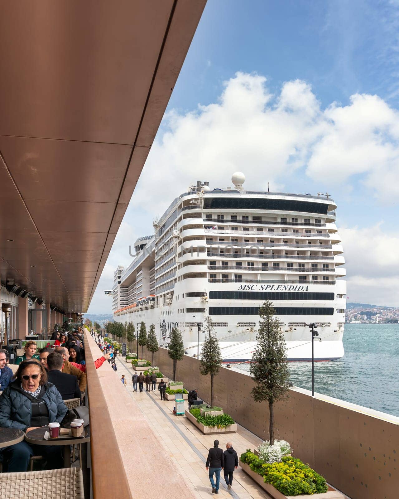 Istanbul, Turkey - May 5, 2023: MSC SPLENDIDA, Large cruise ship docked Galataport, a mixed use development located along shore of Bosphorus strait, in Karakoy neighbourhood