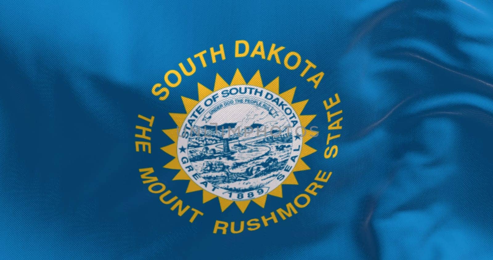 Close-up of the South Dakota flag waving in the wind. Sky blue field, the state seal, and inscriptions of South Dakota and The mount rushmore state. 3d illustration render. Fluttering fabric